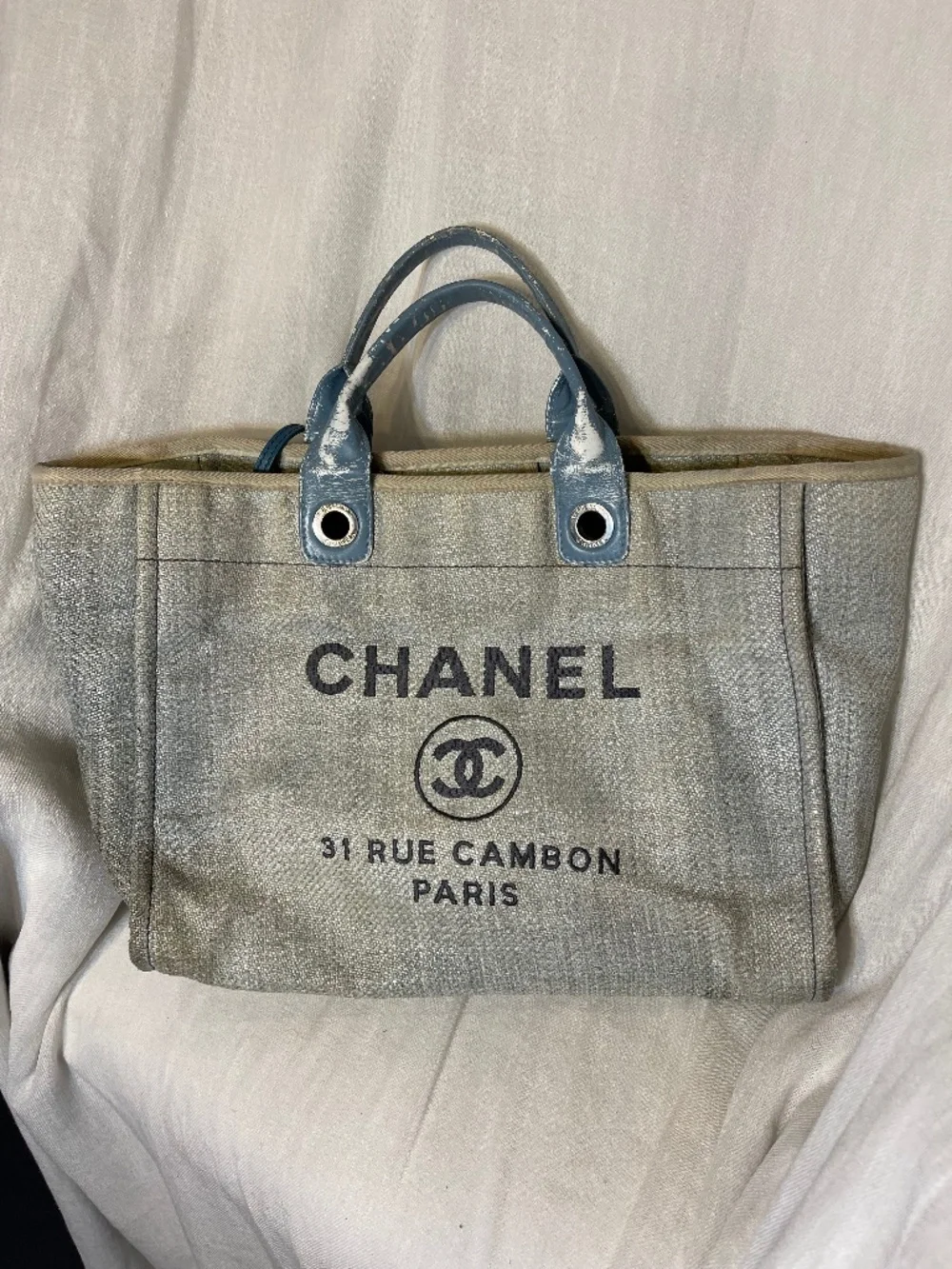 CHANEL Beige Canvas Tote with Blue Handles